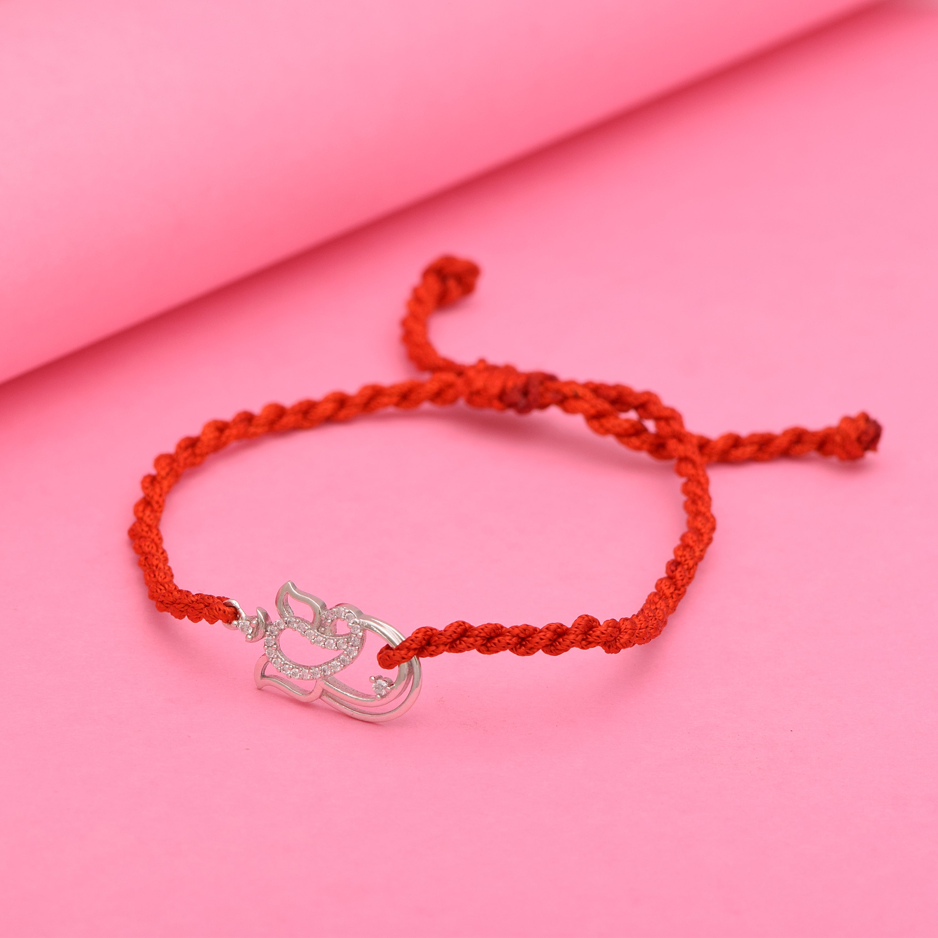 Diamond-Cut Ganesh Charm Rakhi Bracelet - Sterling Silver