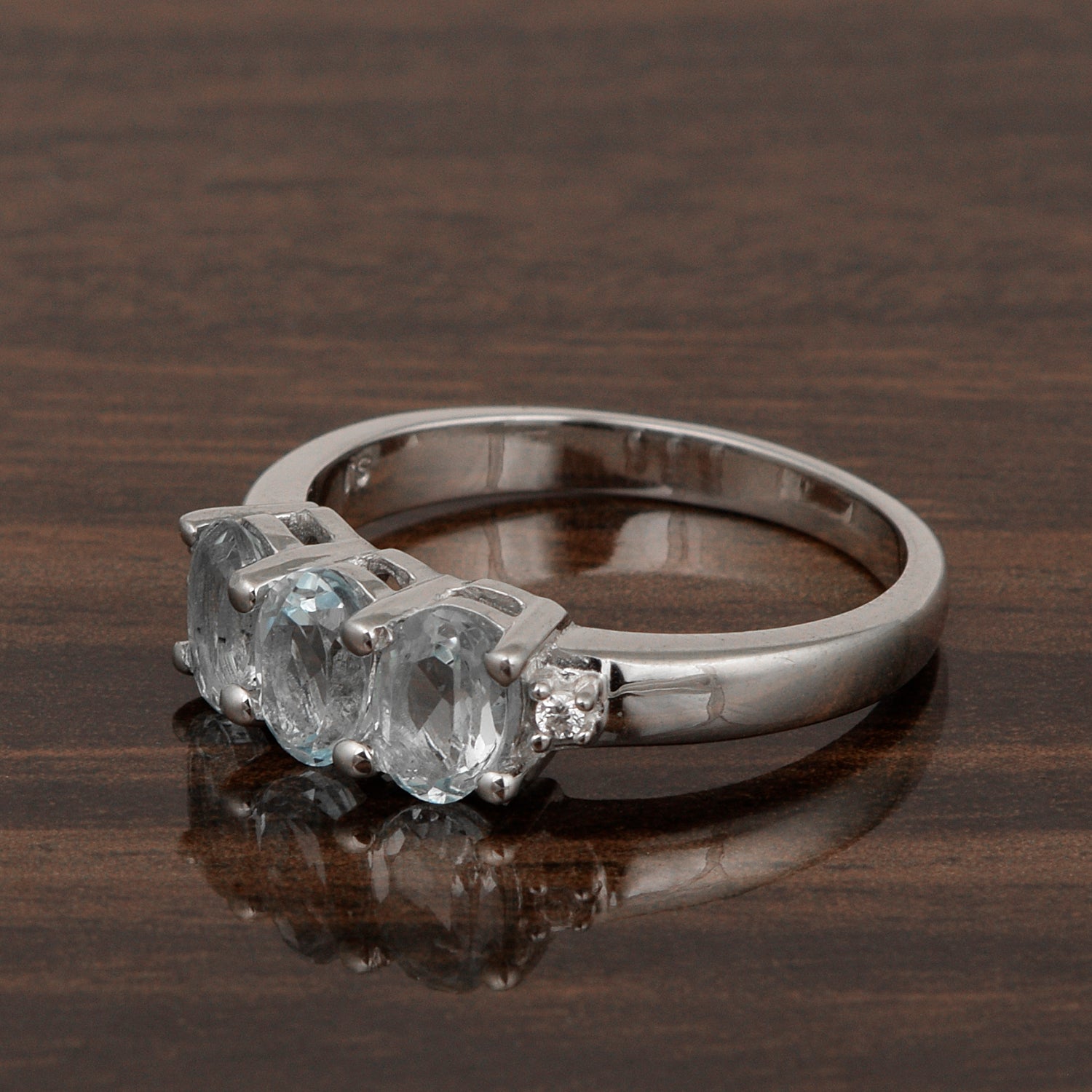 925 Sterling Silver Three-Stone Oval 1.35 Ctw Blue Topaz Women's Ring - Kimaya INC