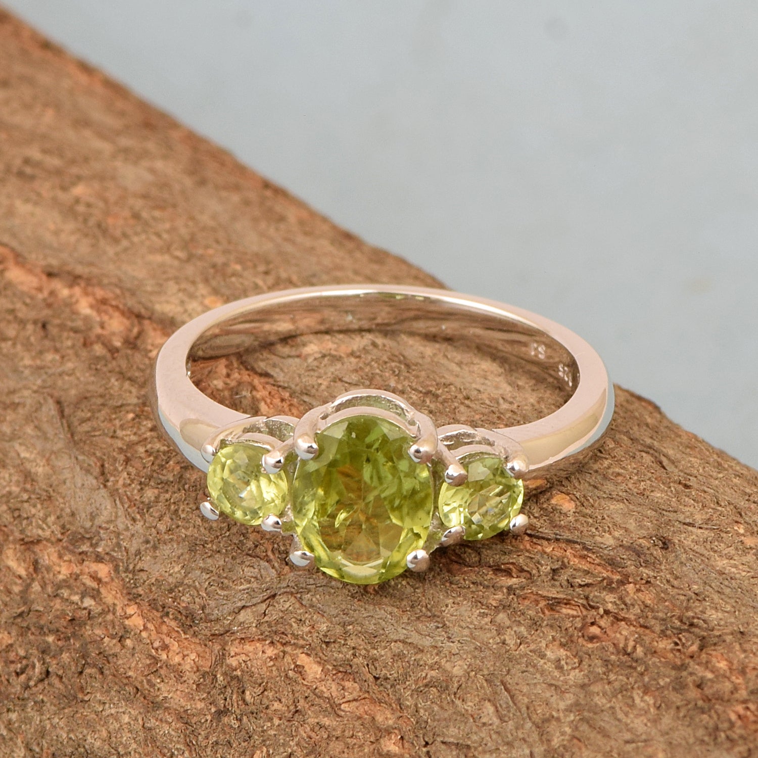 925 Sterling Silver Oval Cut 2.5 Ctw Peridot Gemstone 3-Stone Ring - Kimaya INC