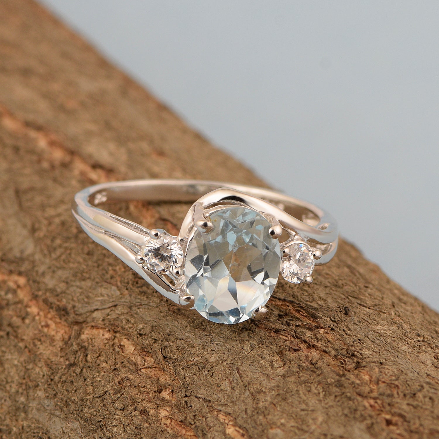 Sterling Silver Oval 2.25 Ctw Aquamarine with White Topaz Accent Women Rings - Kimaya INC
