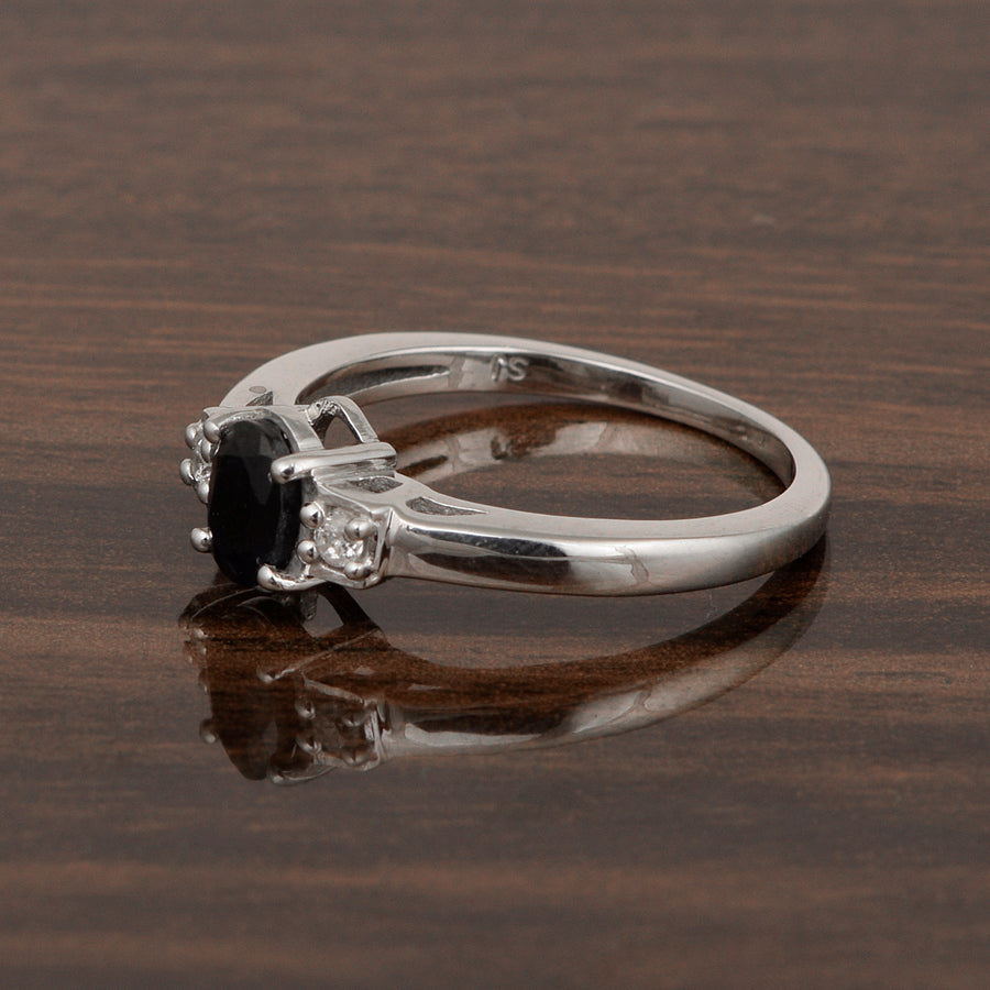 Blue Sapphire Oval and White Topaz Accent Ring - Sterling Silver