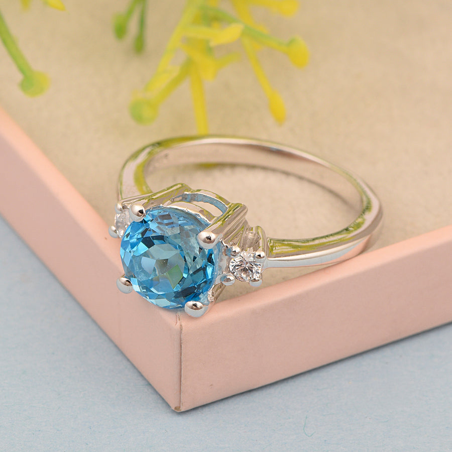 Swiss Blue Topaz Classic Three Stone Ring - Sterling Silver