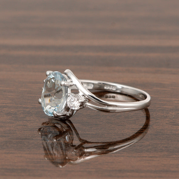 Sterling Silver Oval 2.25 Ctw Swiss Blue Topaz with White Topaz Accent Women Rings - Kimaya INC