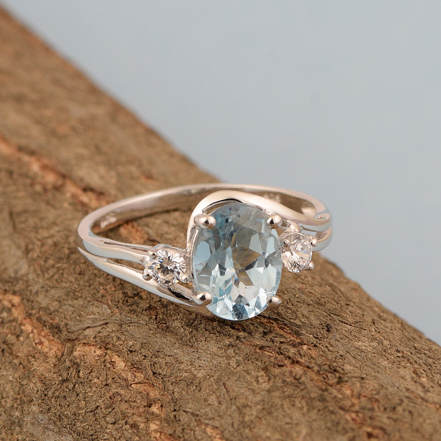 Sterling Silver Oval 2.25 Ctw Swiss Blue Topaz with White Topaz Accent Women Rings - Kimaya INC