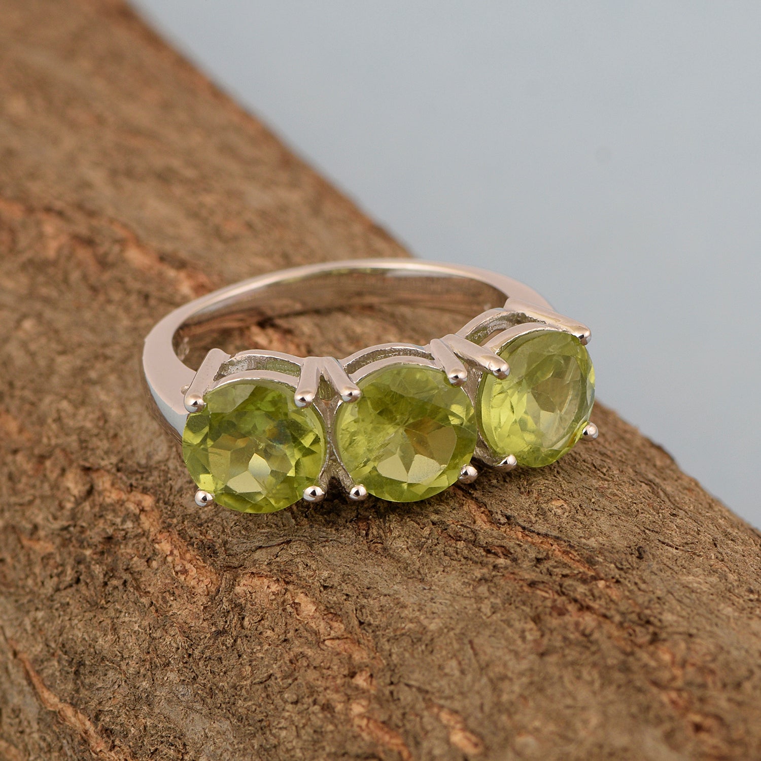 Sterling Silver Natural Peridot 3.55 Ctw Women's 3-Stone Design Ring - Kimaya INC