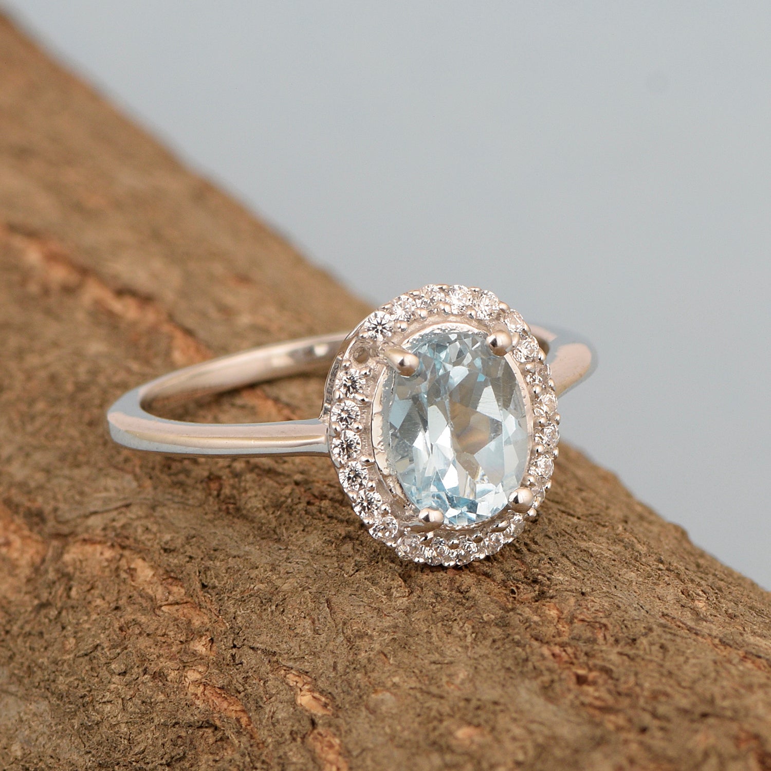 925 Sterling Silver 1.75 Ctw Oval Blue Topaz & White Accents Women Ring - Kimaya INC