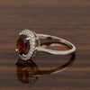 925 Sterling Silver 1.75 Ctw Oval Garnet & White Accents Women Ring - Kimaya INC