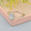 925 Sterling Silver 7x5mm Oval Aquamarine with White Topaz Accent Stones Halo Ring - Kimaya INC
