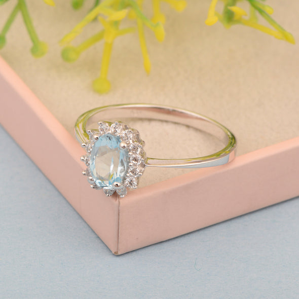 925 Sterling Silver 7x5mm Oval Aquamarine with White Topaz Accent Stones Halo Ring - Kimaya INC