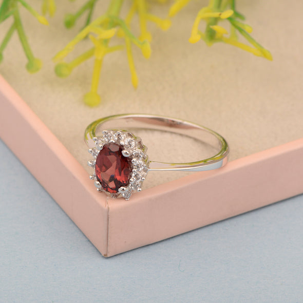 925 Sterling Silver 7x5mm Oval Garnet with White Topaz Accent Stones Halo Ring - Kimaya INC