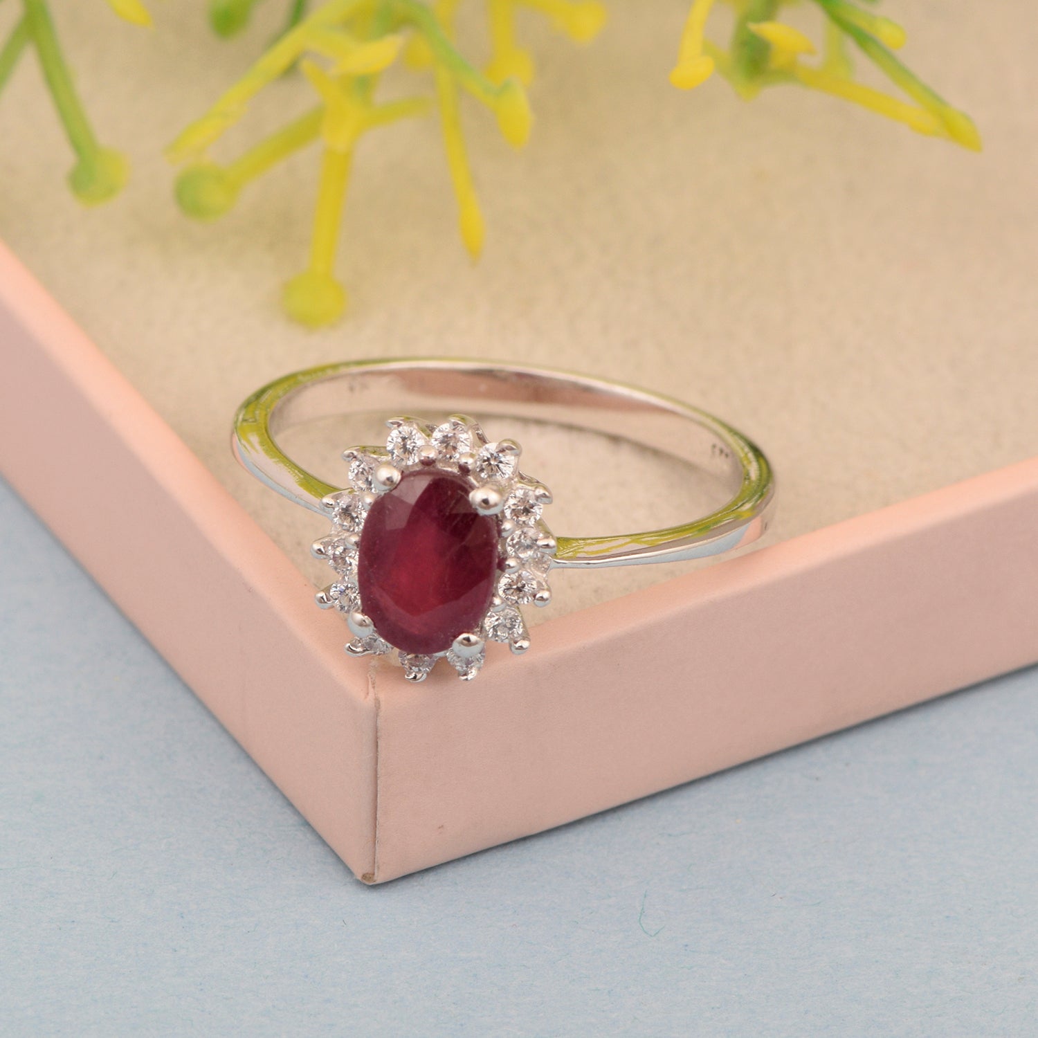 925 Sterling Silver 7x5mm Oval Ruby with White Topaz Accent Stones Halo Ring - Kimaya INC