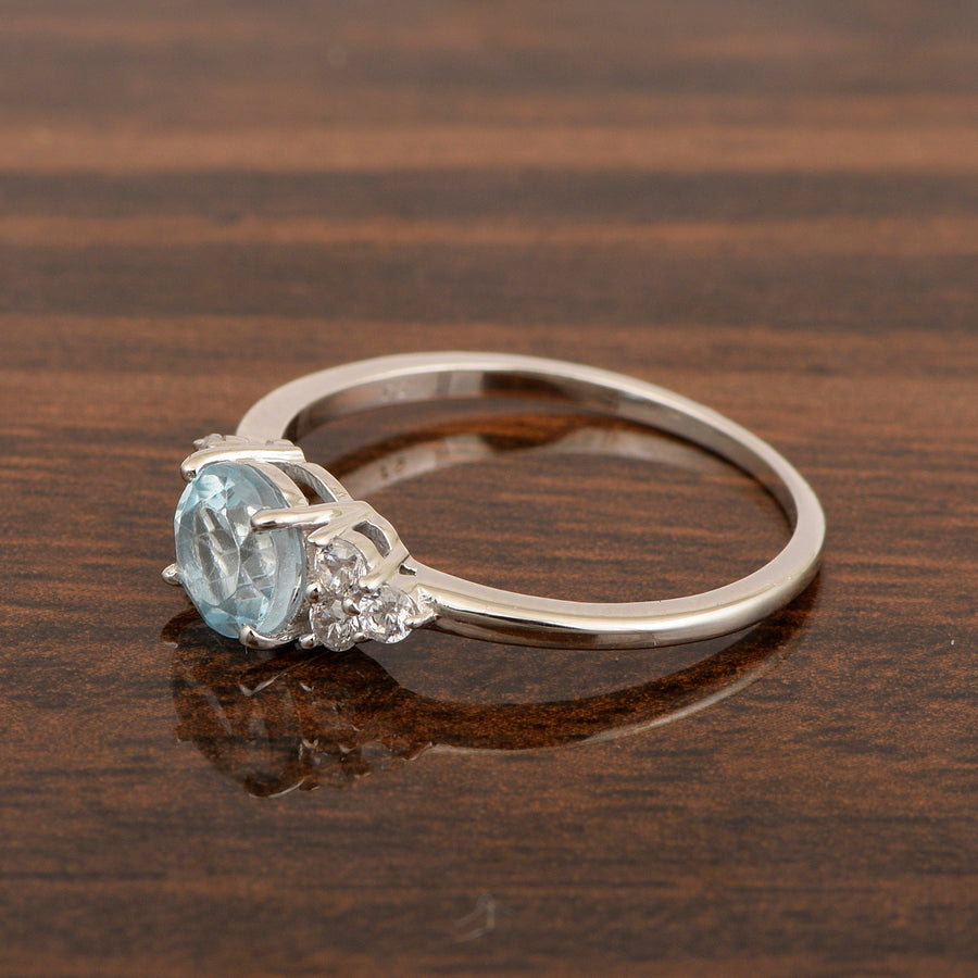 Aquamarine Solitaire With Side Accents Ring - Sterling Silver